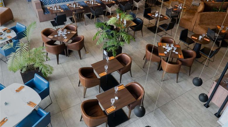 <b>Novotel Medellin El Tesoro Restaurant</b>. Images powered by <a href="https://iceportal.shijigroup.com/" title="IcePortal" target="_blank">IcePortal</a>.
