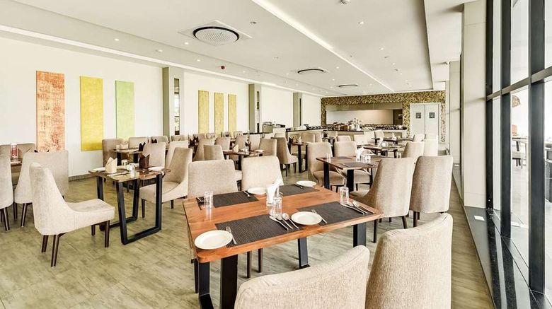 <b>Ramada by Wyndham Bengaluru Yelahanka Restaurant</b>. Images powered by <a href="https://iceportal.shijigroup.com/" title="IcePortal" target="_blank">IcePortal</a>.