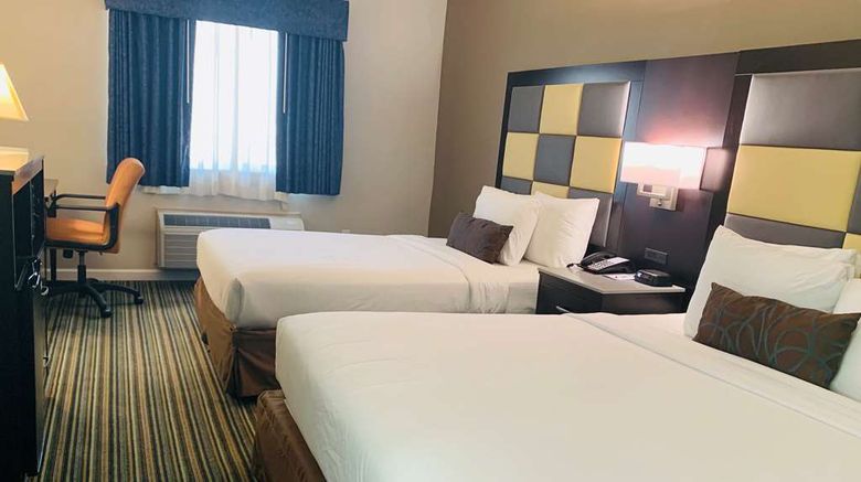 <b>SureStay Plus Hotel Best Western Redding Room</b>. Images powered by <a href="https://iceportal.shijigroup.com/" title="IcePortal" target="_blank">IcePortal</a>.