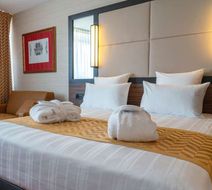 Nash Suites Hotel Room