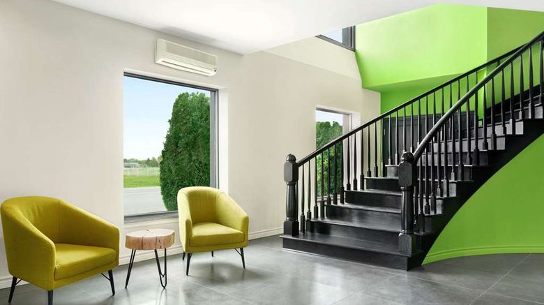 <b>Travelodge by Wyndham Rigaud Lobby</b>. Images powered by <a href="https://iceportal.shijigroup.com/" title="IcePortal" target="_blank">IcePortal</a>.