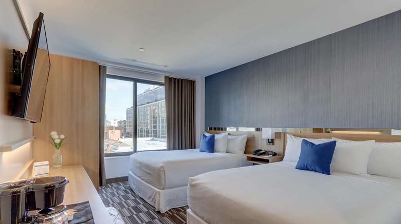 <b>Microtel Inn & Suites Long Island City Room</b>. Images powered by <a href="https://iceportal.shijigroup.com/" title="IcePortal" target="_blank">IcePortal</a>.