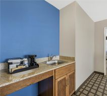 Best Western North Bryant Inn Room