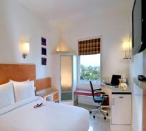 Kalyan Grand Hotel Room