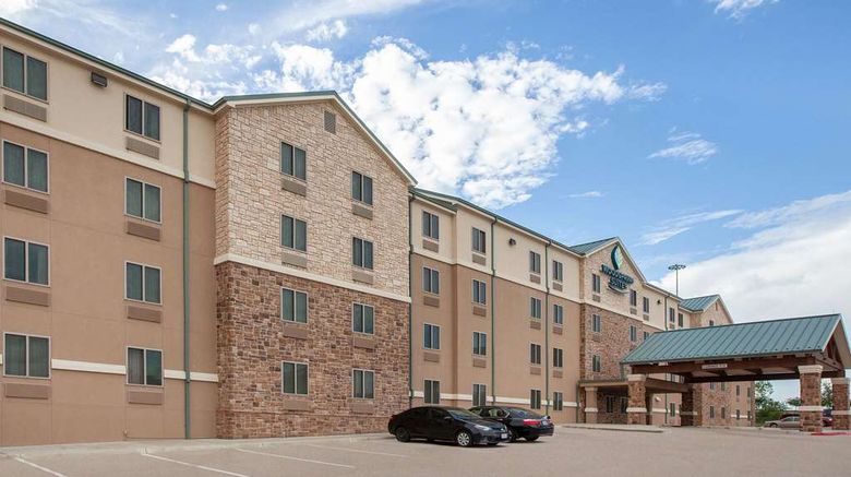 <b>WoodSpring Suites Signature Las Colinas Exterior</b>. Images powered by <a href="https://iceportal.shijigroup.com/" title="IcePortal" target="_blank">IcePortal</a>.
