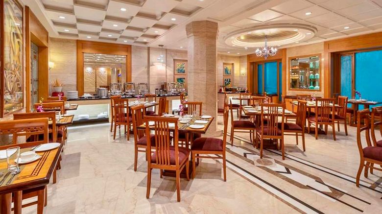 <b>Sarovar Portico Kalupur-Ahmedabad Restaurant</b>. Images powered by <a href="https://iceportal.shijigroup.com/" title="IcePortal" target="_blank">IcePortal</a>.