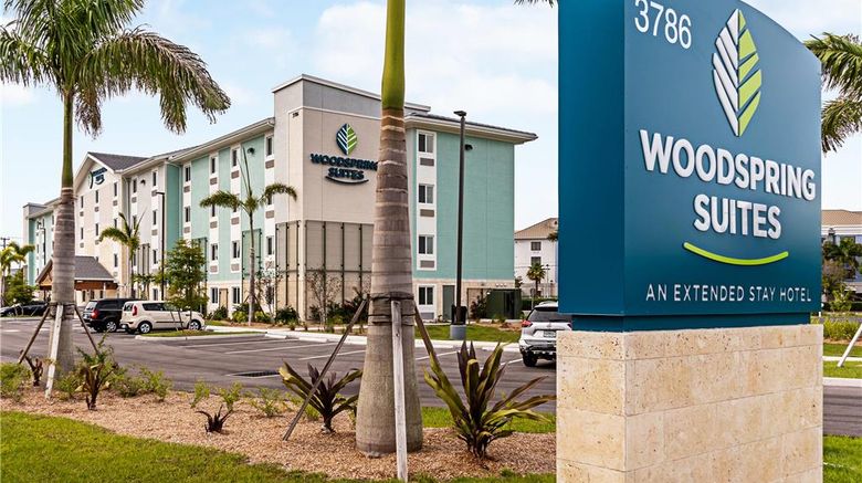 WoodSpring Suites Naples Exterior. Images powered by <a href="https://iceportal.shijigroup.com" target="_blank" rel="noopener">Ice Portal</a>.