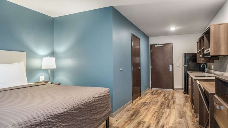 <b>WoodSpring Stes Greenville Haywood Mall Room</b>. Images powered by <a href="https://iceportal.shijigroup.com/" title="IcePortal" target="_blank">IcePortal</a>.