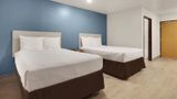 WoodSpring Suites Conroe Room