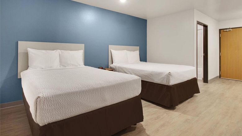 <b>WoodSpring Suites Conroe Room</b>. Images powered by <a href="https://iceportal.shijigroup.com/" title="IcePortal" target="_blank">IcePortal</a>.
