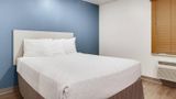 WoodSpring Suites Conroe Room