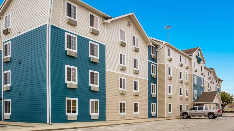 <b>WoodSpring Suites Conroe Exterior</b>. Images powered by <a href="https://iceportal.shijigroup.com/" title="IcePortal" target="_blank">IcePortal</a>.
