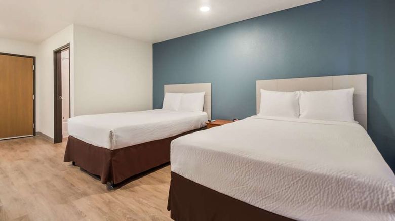 <b>WoodSpring Suites Houston La Porte Room</b>. Images powered by <a href="https://iceportal.shijigroup.com/" title="IcePortal" target="_blank">IcePortal</a>.