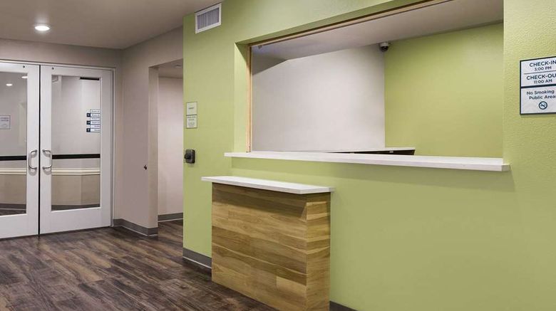 <b>WoodSpring Suites Signature Houston IAH Lobby</b>. Images powered by <a href="https://iceportal.shijigroup.com/" title="IcePortal" target="_blank">IcePortal</a>.