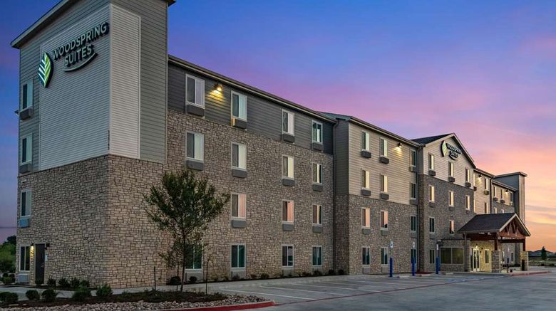 <b>WoodSpring Suites N Alliance TX Speedway Exterior</b>. Images powered by <a href="https://iceportal.shijigroup.com/" title="IcePortal" target="_blank">IcePortal</a>.