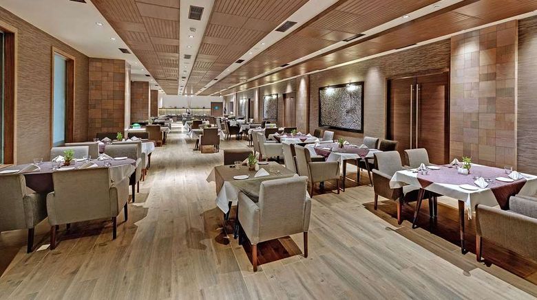 <b>Wyndham Ahmedabad Shela Restaurant</b>. Images powered by <a href="https://iceportal.shijigroup.com/" title="IcePortal" target="_blank">IcePortal</a>.