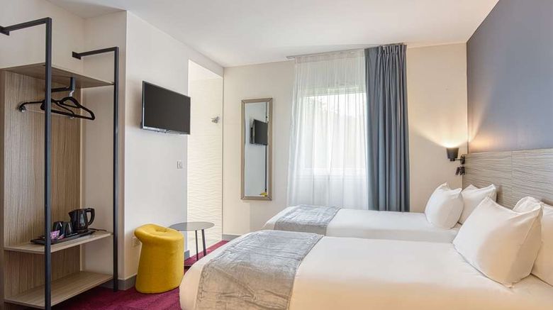 <b>Sure Hotel by BW Les Portes de Montauban Room</b>. Images powered by <a href="https://iceportal.shijigroup.com/" title="IcePortal" target="_blank">IcePortal</a>.