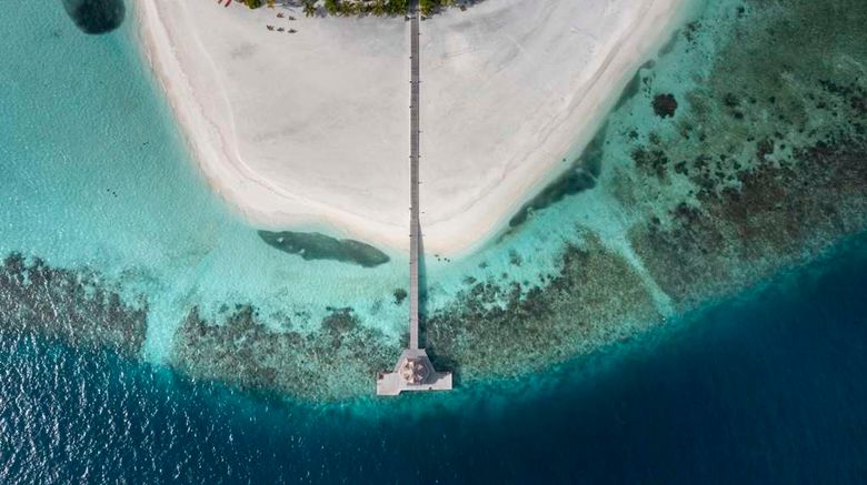 <b>Banyan Tree Vabbinfaru Exterior</b>. Images powered by <a href=https://www.travelagewest.com/Hotels/Male-Maldives/