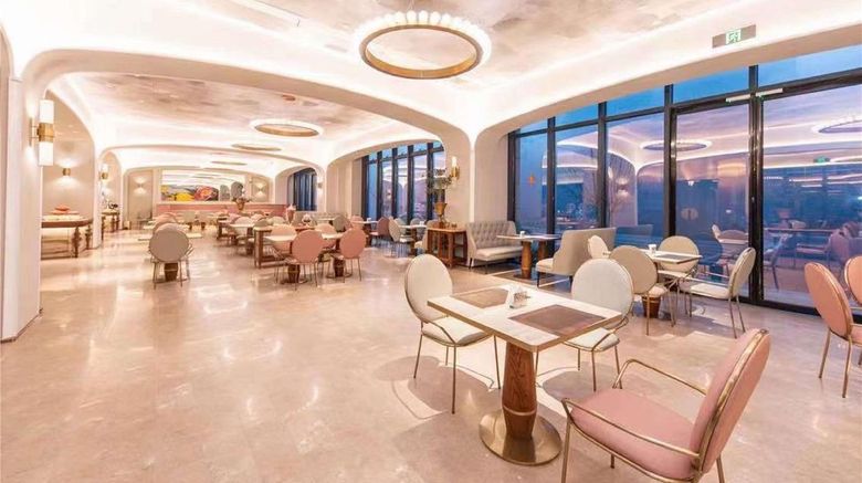 <b>Mercure Xinyang East Railway Station Restaurant</b>. Images powered by <a href="https://iceportal.shijigroup.com/" title="IcePortal" target="_blank">IcePortal</a>.