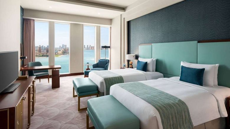 <b>Wyndham Grand Doha West Bay Beach Room</b>. Images powered by <a href="https://iceportal.shijigroup.com/" title="IcePortal" target="_blank">IcePortal</a>.