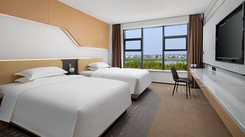 <b>Microtel by Wyndham Miluo Downtown Hotel Room</b>. Images powered by <a href="https://iceportal.shijigroup.com/" title="IcePortal" target="_blank">IcePortal</a>.
