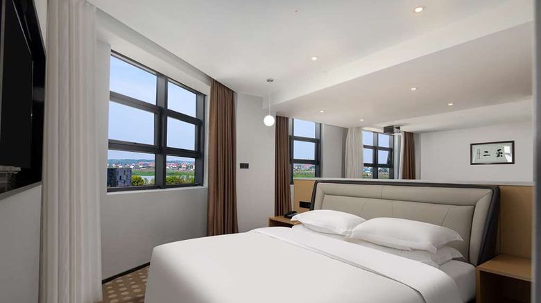 <b>Microtel by Wyndham Miluo Downtown Hotel Suite</b>. Images powered by <a href="https://iceportal.shijigroup.com/" title="IcePortal" target="_blank">IcePortal</a>.