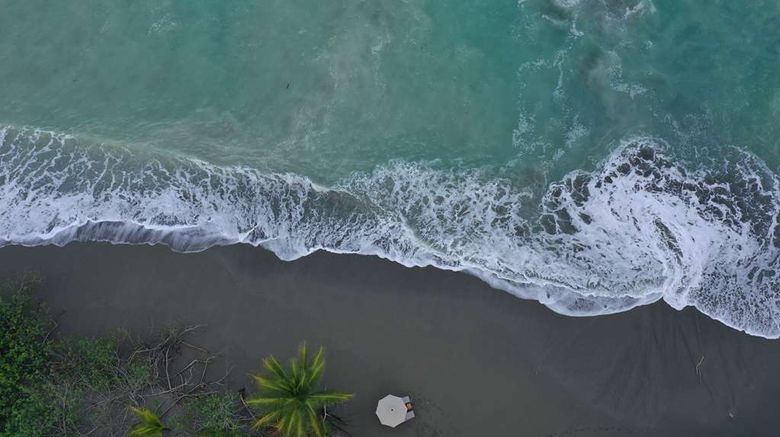 <b>Lapa Rios Ecolodge Beach</b>. Images powered by <a href="https://iceportal.shijigroup.com/" title="IcePortal" target="_blank">IcePortal</a>.