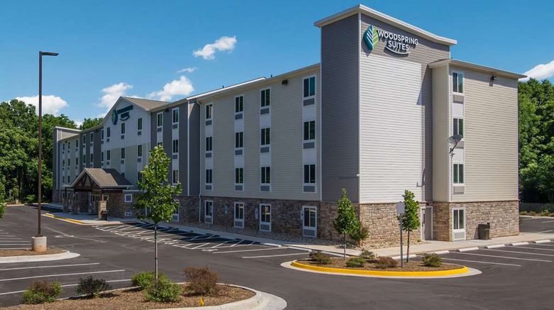 WoodSpring Suites Exterior. Images powered by <a href="https://iceportal.shijigroup.com" target="_blank" rel="noopener">Ice Portal</a>.