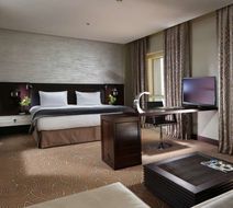 The Tower Plaza Hotel Room