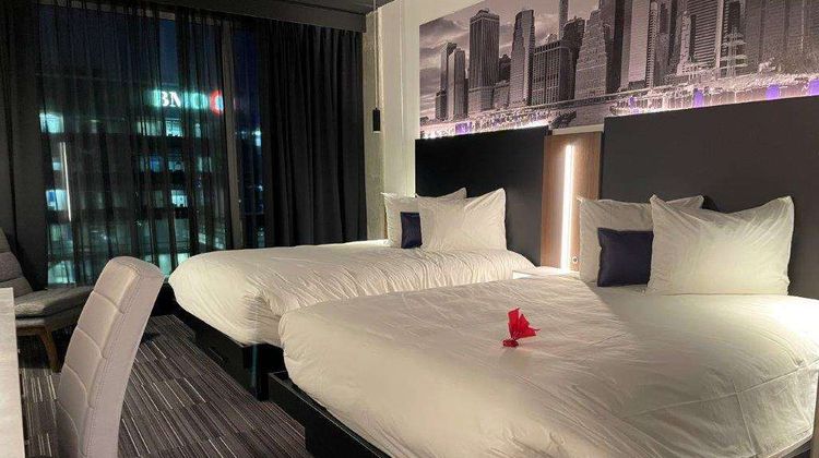Grand Times Hotel Laval Room
