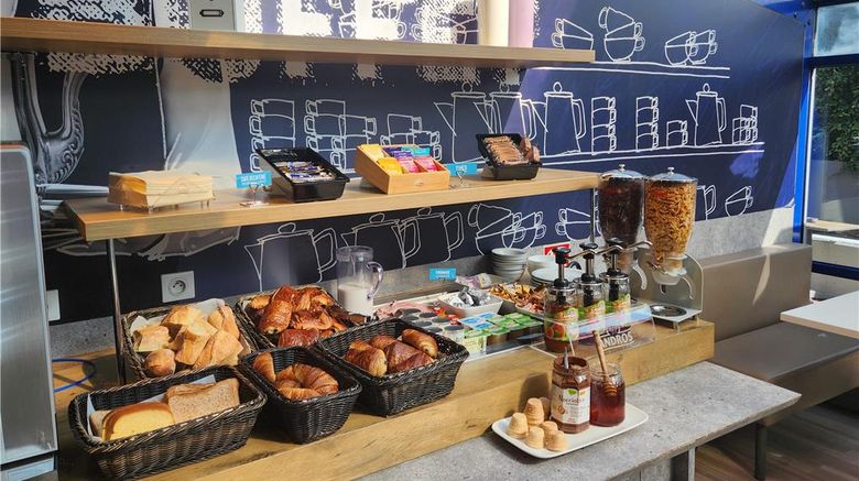 <b>Ibis Budget Lyon Dardilly Restaurant</b>. Images powered by <a href="https://iceportal.shijigroup.com/" title="IcePortal" target="_blank">IcePortal</a>.