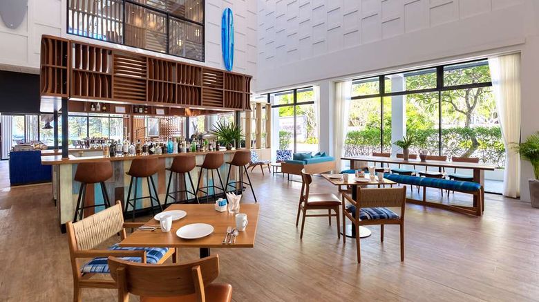 <b>Outrigger Surin Beach Resort Restaurant</b>. Images powered by <a href="https://iceportal.shijigroup.com/" title="IcePortal" target="_blank">IcePortal</a>.