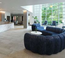 River's Edge Hotel, Tapestry Coll Hilton Lobby