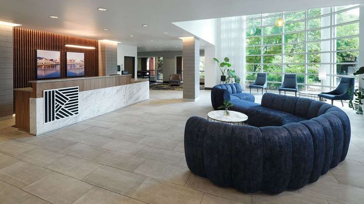 River's Edge Hotel, Tapestry Coll Hilton Lobby
