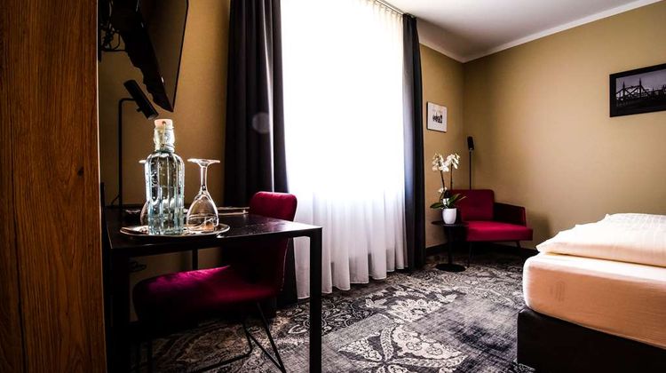 AKZENT-Hotel Roter Lowe Room