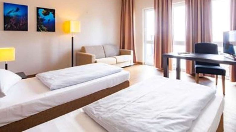 <b>Friendly Cityhotel Oktopus Room</b>. Images powered by <a href="https://iceportal.shijigroup.com/" title="IcePortal" target="_blank">IcePortal</a>.