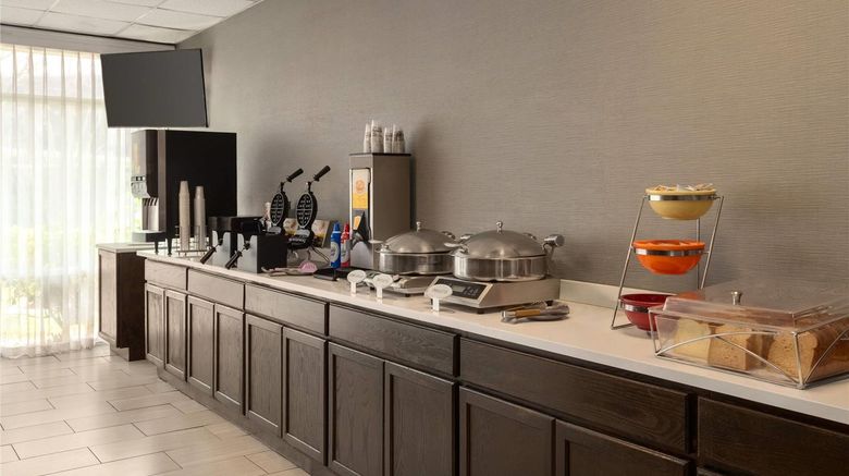 <b>Ramada by Wyndham Cocoa Restaurant</b>. Images powered by <a href="https://iceportal.shijigroup.com/" title="IcePortal" target="_blank">IcePortal</a>.