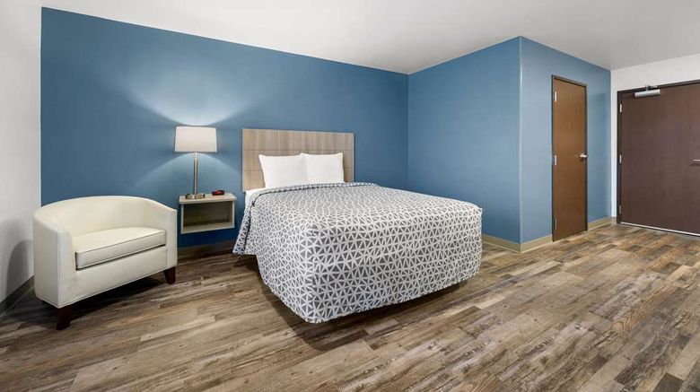 <b>WoodSpring Suites Dearborn-Detroit Room</b>. Images powered by <a href="https://iceportal.shijigroup.com/" title="IcePortal" target="_blank">IcePortal</a>.