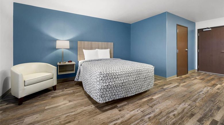 <b>WoodSpring Suites Dearborn-Detroit Room</b>. Images powered by <a href="https://iceportal.shijigroup.com/" title="IcePortal" target="_blank">IcePortal</a>.
