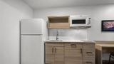 <b>WoodSpring Suites Dearborn-Detroit Room</b>. Images powered by <a href="https://iceportal.shijigroup.com/" title="IcePortal" target="_blank">IcePortal</a>.