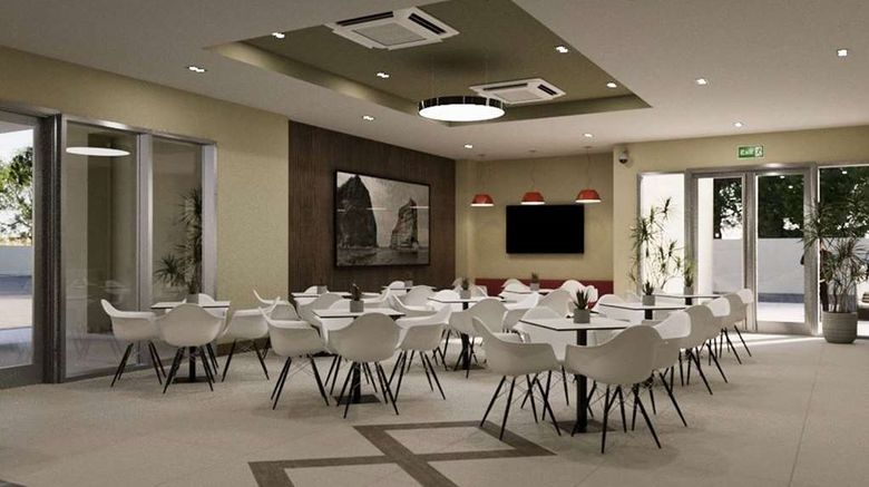 <b>Wyndham Garden El Morro Monte Christi Restaurant</b>. Images powered by <a href="https://iceportal.shijigroup.com/" title="IcePortal" target="_blank">IcePortal</a>.