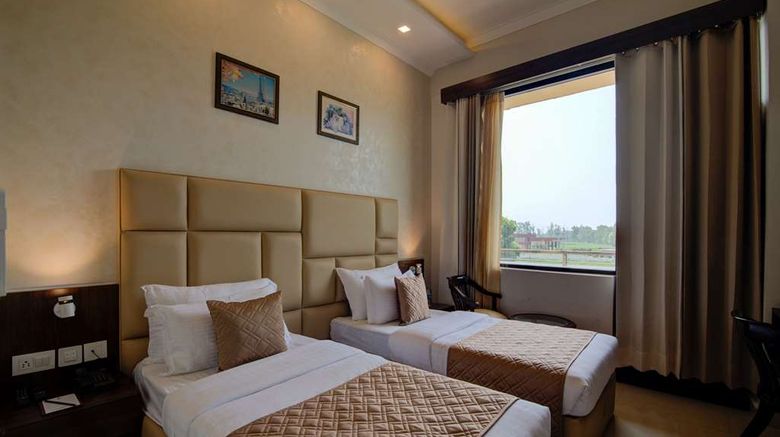 <b>Comfort Inn Karnal Room</b>. Images powered by <a href="https://iceportal.shijigroup.com/" title="IcePortal" target="_blank">IcePortal</a>.