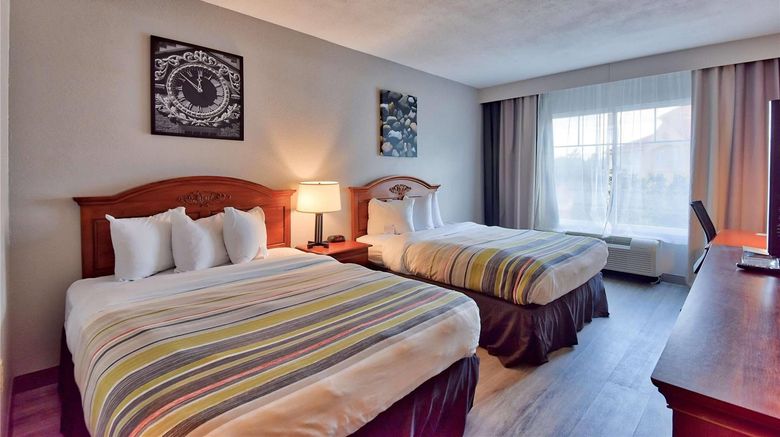 <b>Country Inn & Suites Ocala Room</b>. Images powered by <a href="https://iceportal.shijigroup.com/" title="IcePortal" target="_blank">IcePortal</a>.