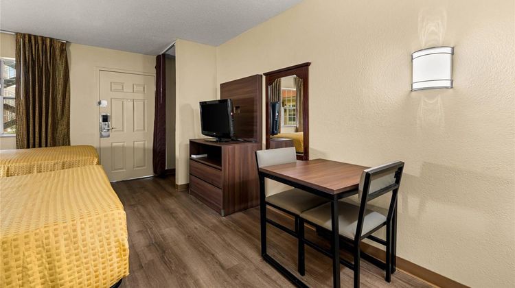 Suburban Studios near Hanes Mall Room