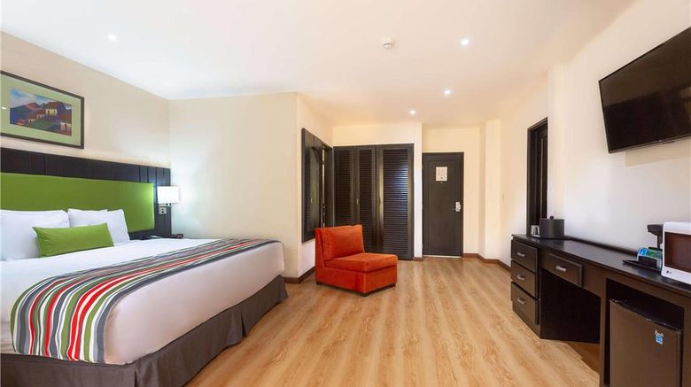 Country Inn  and  Suites San Jose Aeropuerto Room. Images powered by <a href="https://iceportal.shijigroup.com" target="_blank" rel="noopener">Ice Portal</a>.