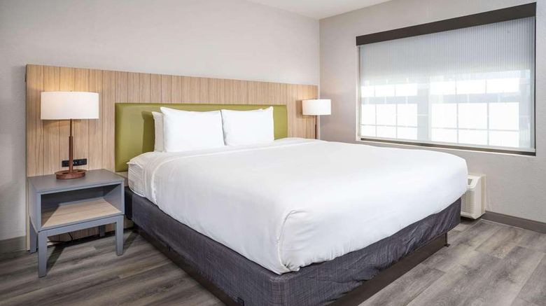 <b>Country Inn & Suites Stone Mountain Room</b>. Images powered by <a href="https://iceportal.shijigroup.com/" title="IcePortal" target="_blank">IcePortal</a>.