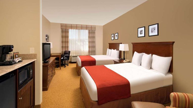 <b>Country Inn & Suites Houston IAH East Room</b>. Images powered by <a href="https://iceportal.shijigroup.com/" title="IcePortal" target="_blank">IcePortal</a>.