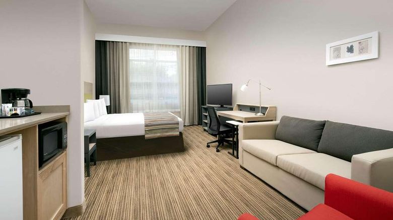 <b>Country Inn & Suites Houston IAH East Room</b>. Images powered by <a href="https://iceportal.shijigroup.com/" title="IcePortal" target="_blank">IcePortal</a>.