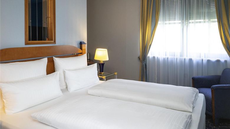 <b>Atomis Hotel Munich Airport by Mercure Room</b>. Images powered by <a href="https://iceportal.shijigroup.com/" title="IcePortal" target="_blank">IcePortal</a>.