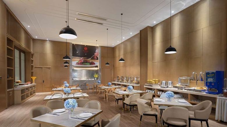 <b>Ramada by Wyndham Financial Center Restaurant</b>. Images powered by <a href="https://iceportal.shijigroup.com/" title="IcePortal" target="_blank">IcePortal</a>.